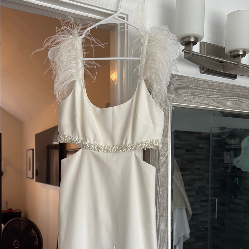 Elegant White Dress with Feather Details